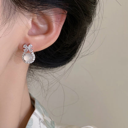 LunaGlow Ethereal Stud Earrings